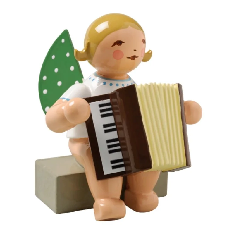 Sitting Angel with Accordion made by Wendt und Kuhn