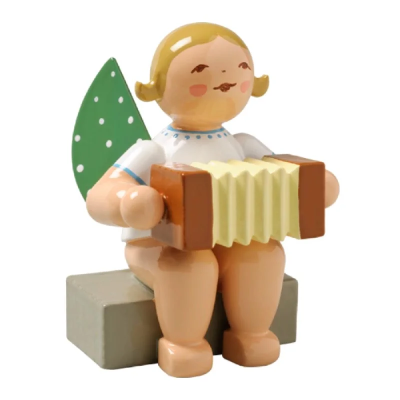 Sitting Brunette Angel with Concertina made by Wendt und Kuhn